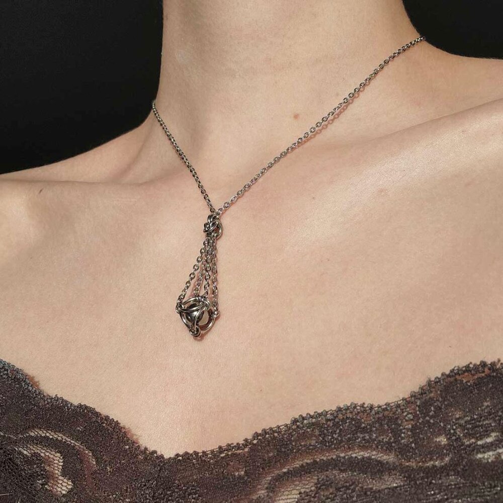 Classic vintage antique silver basket necklace with a small silver chain
